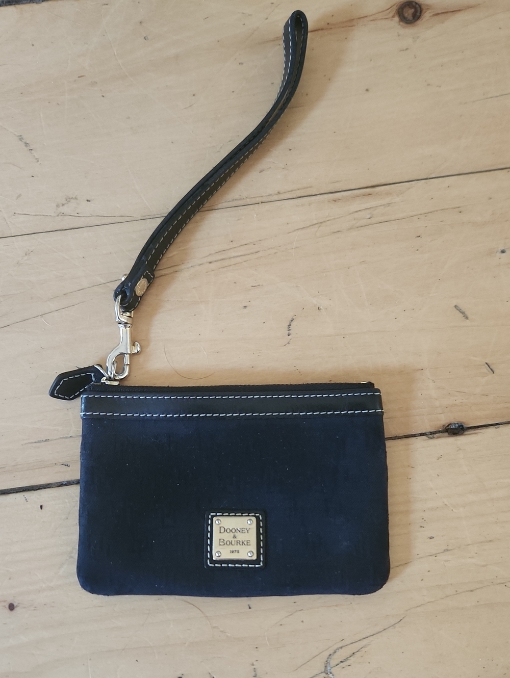 Dooney & Bourke Black Wristlet with White Stitching